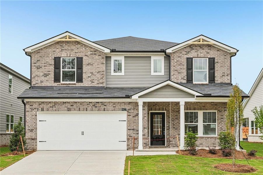 Front exterior of a new home in Westmont Preserve, Powder Springs, GA, highlighting curb appeal (Image 29).