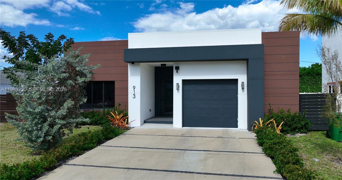 Front exterior of a new home in , Fort Lauderdale, FL, highlighting curb appeal (Image 25). Front exterior of a new home in , Fort Lauderdale, FL, highlighting curb appeal (Image 25).