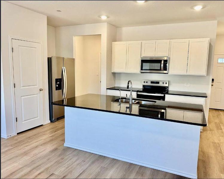 Photo is not of the actual home, but is an inspirational photo of builder’s model home and may depict options, furnishings, and/or decorator features that are not included