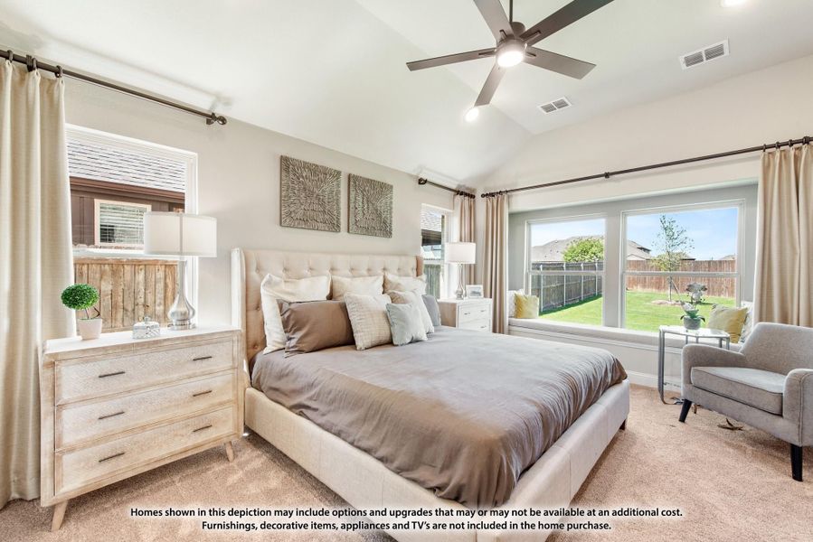 Master bedroom with vaulted ceiling, ceiling fan, large windows, and neutral carpet flooring Master bedroom with vaulted ceiling, ceiling fan, large windows, and neutral carpet flooring