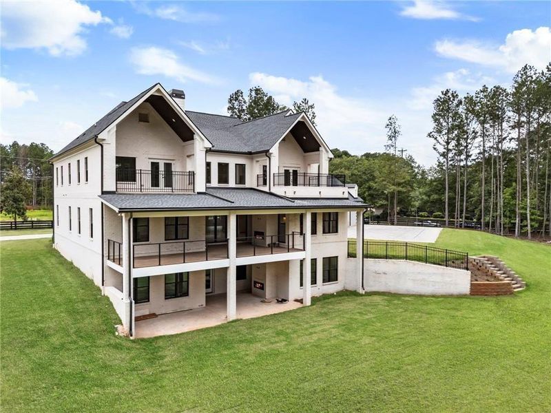 Front exterior of a new home in , Milton, GA, highlighting curb appeal (Image 23). Front exterior of a new home in , Milton, GA, highlighting curb appeal (Image 23).