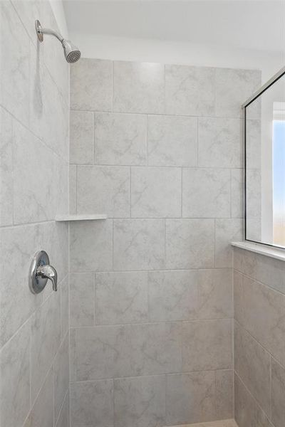 Full bath with a tile shower Full bath with a tile shower