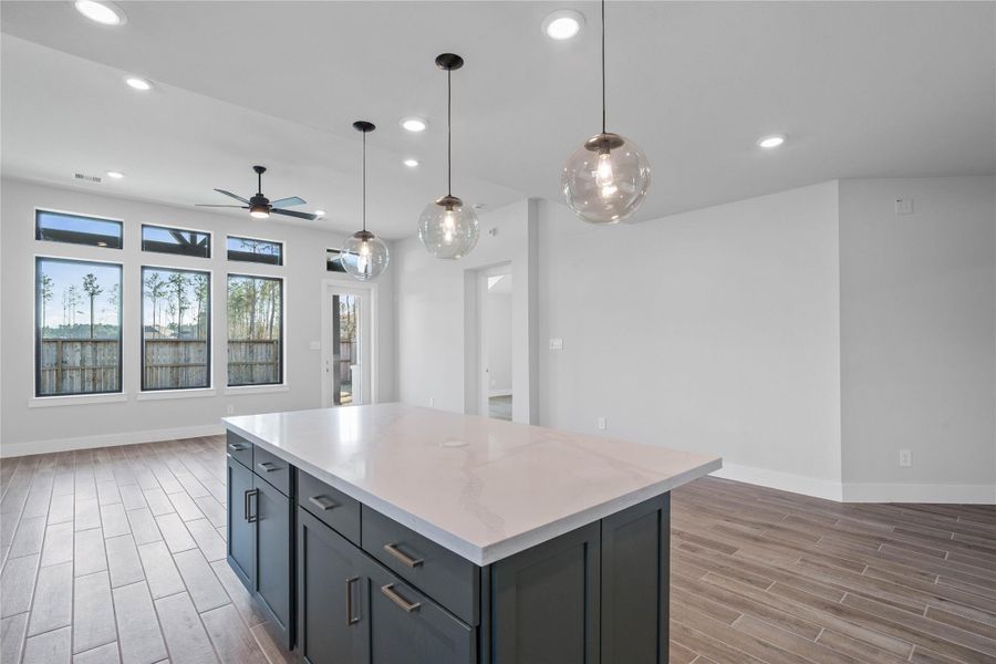 This dining area is a natural extension of the kitchen and living room, allowing for seamless conversation and connection with guests or family members, even when preparing a meal. This dining area is a natural extension of the kitchen and living room, allowing for seamless conversation and connection with guests or family members, even when preparing a meal.