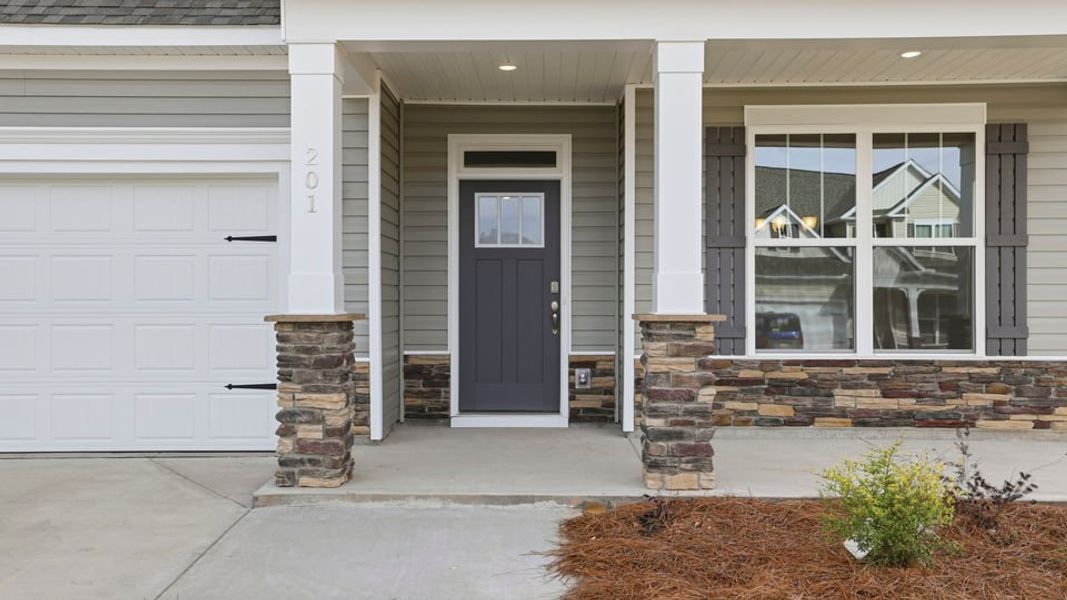 Exterior details and patio area of a home in Seven Oaks, Greenwood (Image 3). Exterior details and patio area of a home in Seven Oaks, Greenwood (Image 3).
