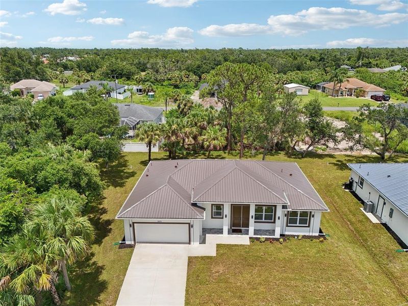 Front exterior of a new home in , North Port, FL, highlighting curb appeal (Image 20).