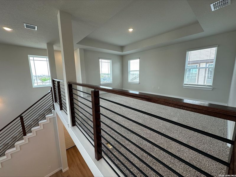 Spacious, unfurnished interior of a new home in Hunters Ranch, San Antonio (Image 6).