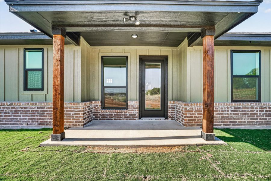 Exterior details and patio area of a home in Taylor Ranch, Springtown (Image 3).