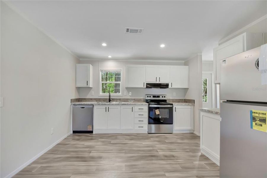 Furnished interior view inside a new home in , Hernando (Image 6).