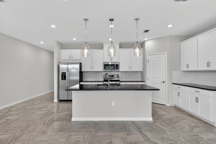 Representative furnished interior of a home built from the Bellflower by Taylor Morrison in Cherry Elm at SilverLeaf, St. Augustine (Image 11).