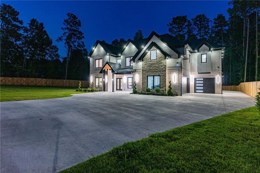 Front exterior of a new home in , Lawrenceville, GA, highlighting curb appeal (Image 34). Front exterior of a new home in , Lawrenceville, GA, highlighting curb appeal (Image 34).