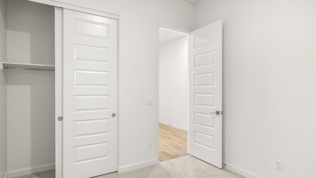 Spacious, unfurnished interior of a new home in The Ridge at Stone Butte, Phoenix (Image 19).