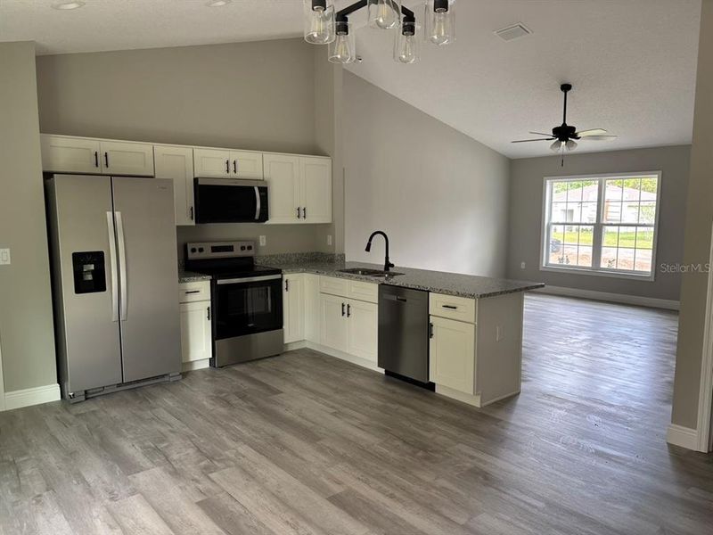 Furnished interior view inside a new home in , Dunnellon (Image 6).