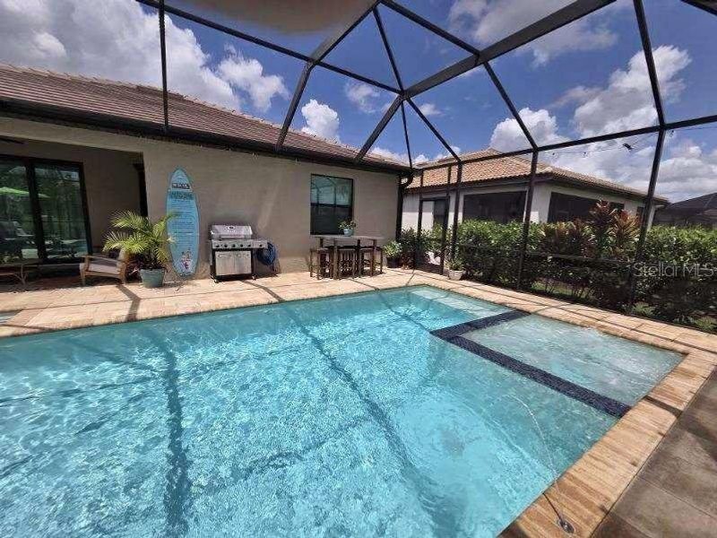 Exterior details and patio area of a home in , Estero (Image 4).