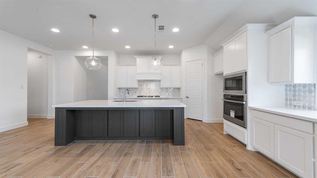 Furnished interior view inside a new home in North Sky 55', Celina (Image 14).