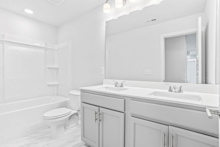 Furnished interior view inside a new home in Waters Edge, Mansfield (Image 7).