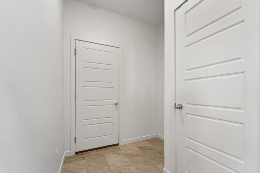 Spacious, unfurnished interior of a new home in Union Colony West, Greeley (Image 25).