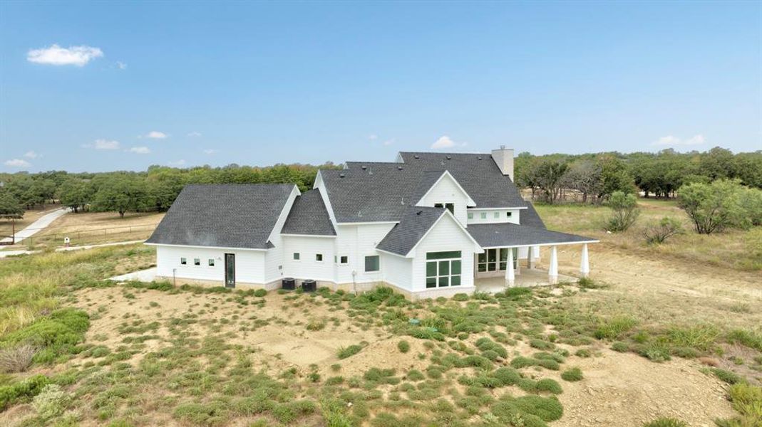 Front exterior of a new home in , Sunset, TX, highlighting curb appeal (Image 19). Front exterior of a new home in , Sunset, TX, highlighting curb appeal (Image 19).
