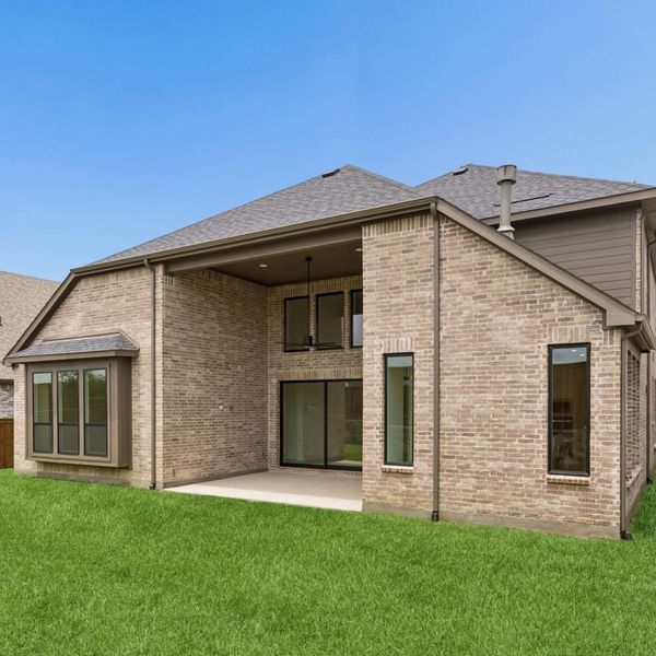 Exterior details and patio area of a home in Mosaic – 70′ Lots, Celina (Image 31).