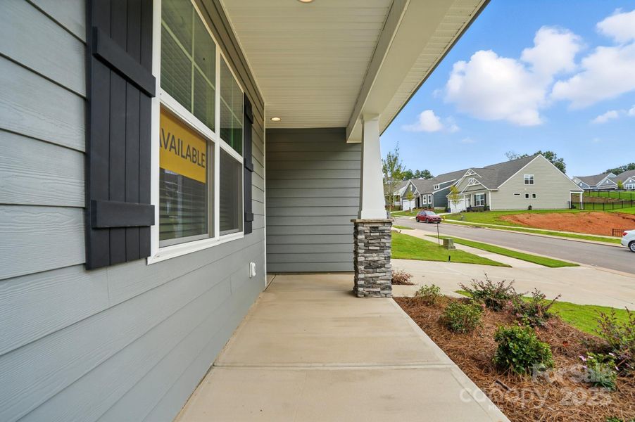 Front exterior of a new home in Villas at Prestwick, Mooresville, NC, highlighting curb appeal (Image 23).