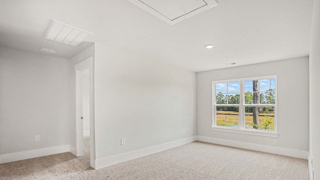 Representative unfurnished interior of a home built from the Mackenzie2 by D.R. Horton in Chapman Village, Conway (Image 9).