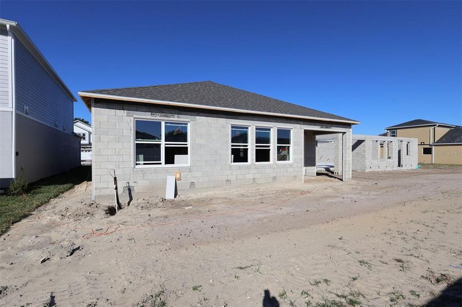 Exterior details and patio area of a home in Estates at Rivercrest, Sanford (Image 4).