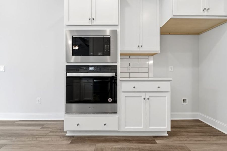 Furnished interior view inside a new home in Weybridge, Burlington (Image 10).