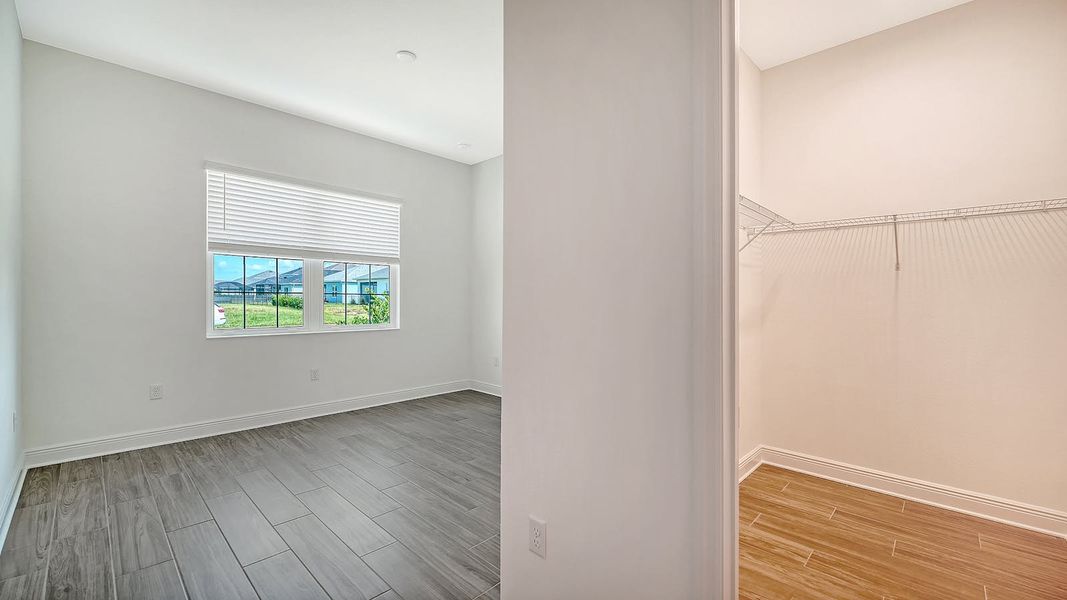 Spacious, unfurnished interior of a new home in Canoe Creek Real Estate and Homes for Sale in Parrish, FL - Neal Communities, Parrish (Image 31). Spacious, unfurnished interior of a new home in Canoe Creek Real Estate and Homes for Sale in Parrish, FL - Neal Communities, Parrish (Image 31).