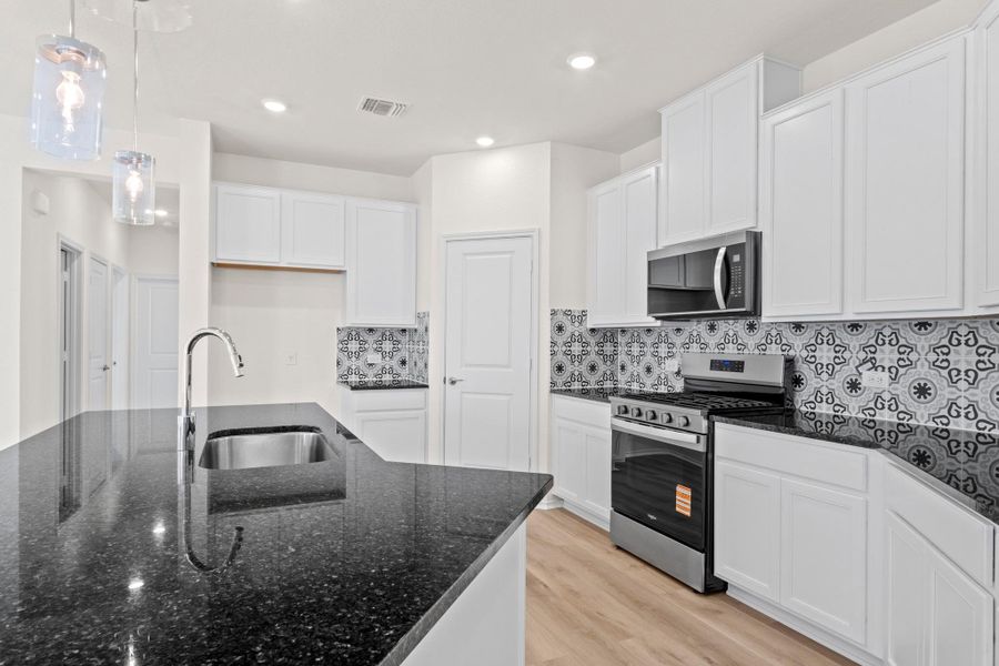 Furnished interior view inside a new home in Salerno - Heritage Collection, Round Rock (Image 5). Furnished interior view inside a new home in Salerno - Heritage Collection, Round Rock (Image 5).