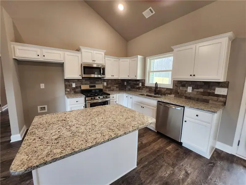 Furnished interior view inside a new home in , Carrollton (Image 5).