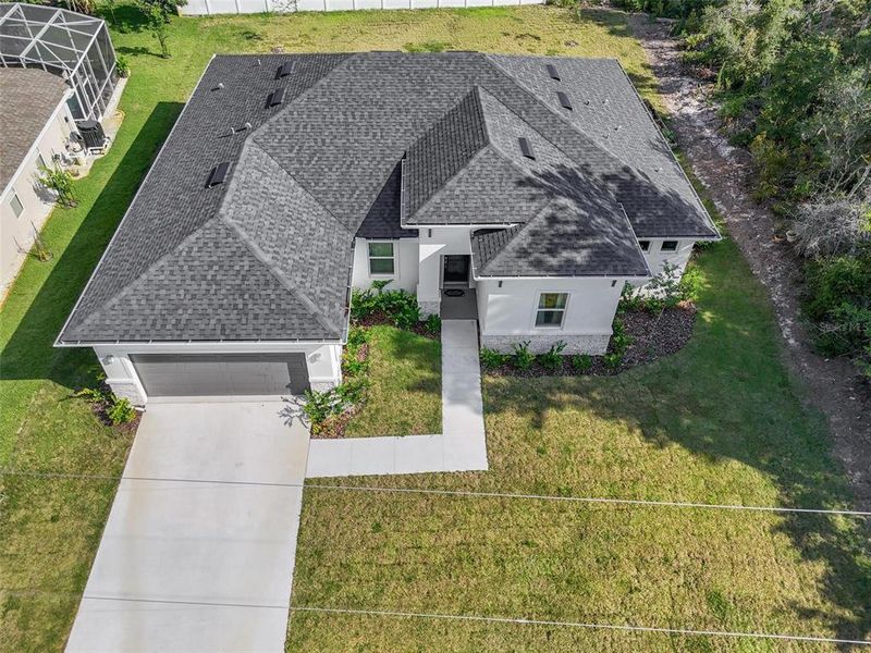 Front exterior of a new home in , Palm Coast, FL, highlighting curb appeal (Image 26).