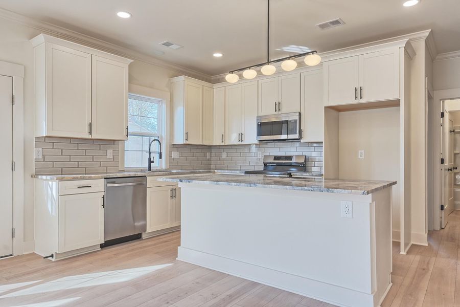 Furnished interior view inside a new home in , North Charleston (Image 4).