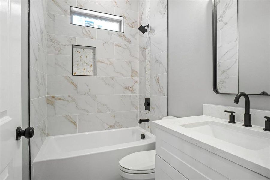 Bathroom with vanity and bathtub / shower combination Bathroom with vanity and bathtub / shower combination