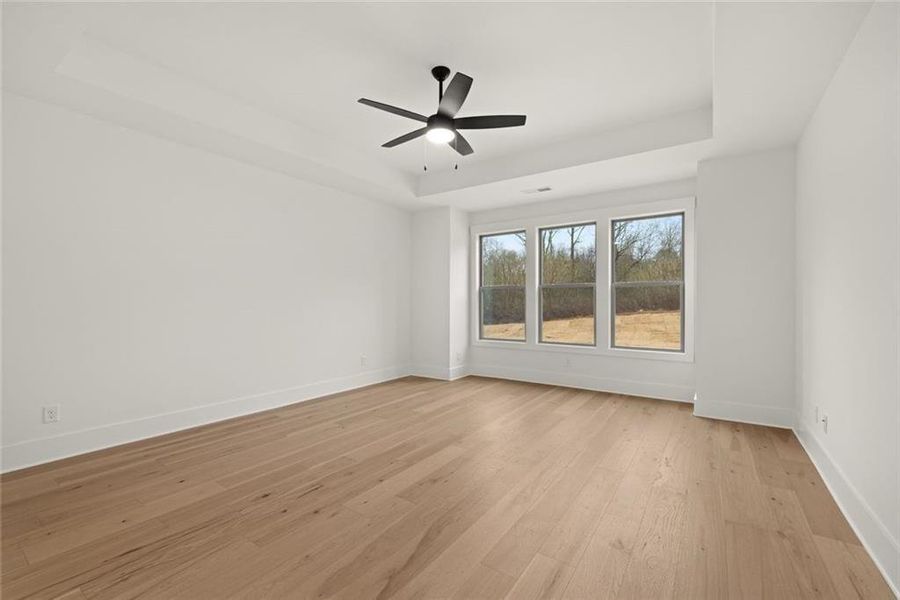 Spacious, unfurnished interior of a new home in Soleil Belmont Park, Canton (Image 41).