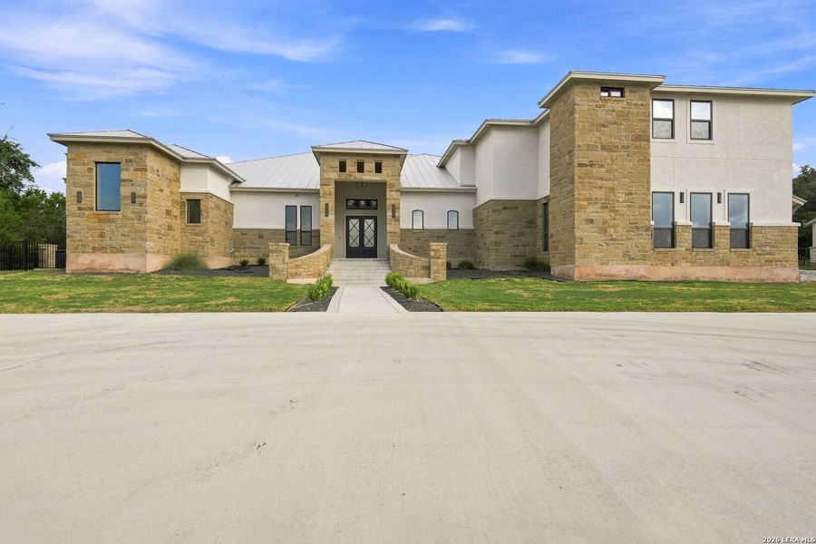 Front exterior of a new home in , Canyon Lake, TX, highlighting curb appeal (Image 17). Front exterior of a new home in , Canyon Lake, TX, highlighting curb appeal (Image 17).