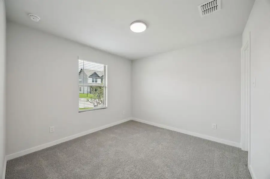 Bedroom in the Hadley home plan by Trophy Signature Homes – REPRESENTATIVE PHOTO Bedroom in the Hadley home plan by Trophy Signature Homes – REPRESENTATIVE PHOTO