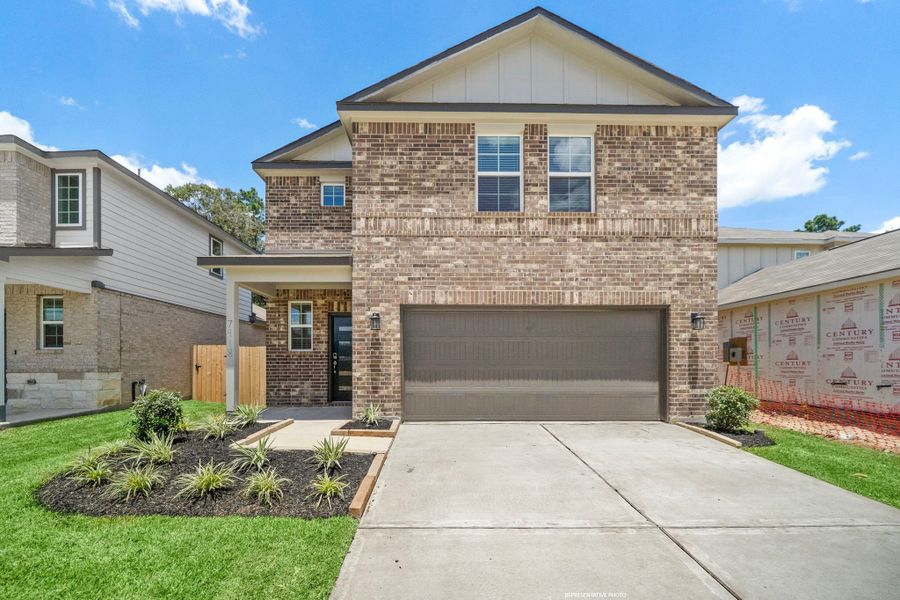 A house with a garage. A house with a garage.