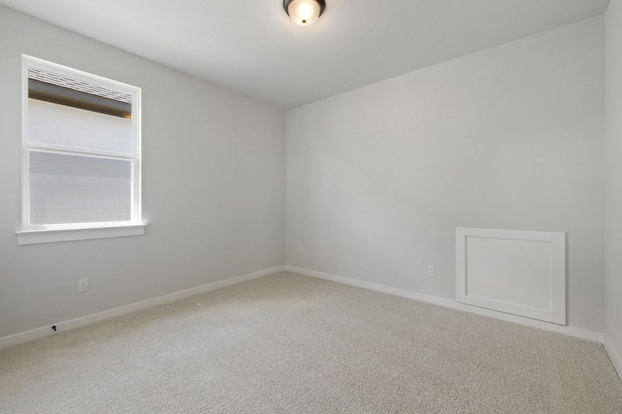 Spacious, unfurnished interior of a new home in Heritage, Dripping Springs (Image 41).
