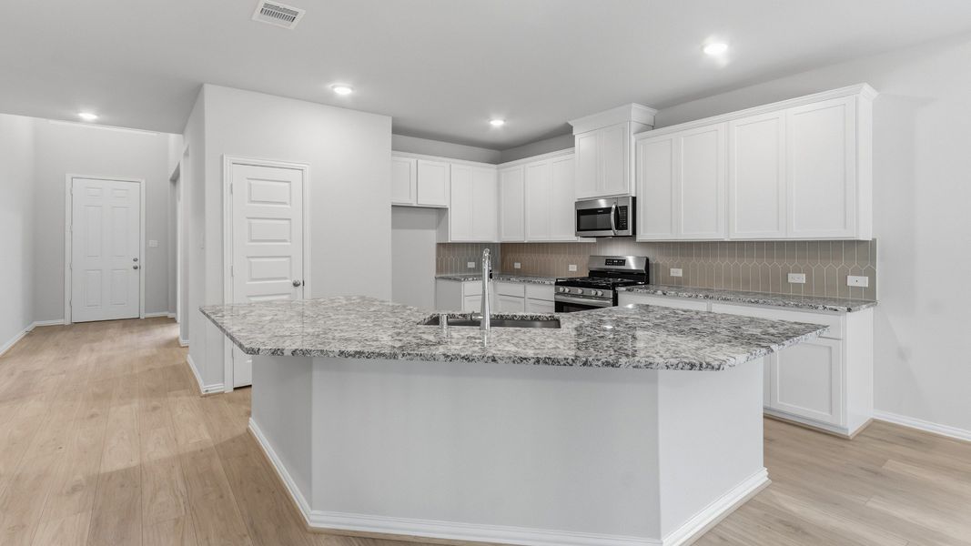 Furnished interior view inside a new home in The Woodlands Hills, Willis (Image 11).