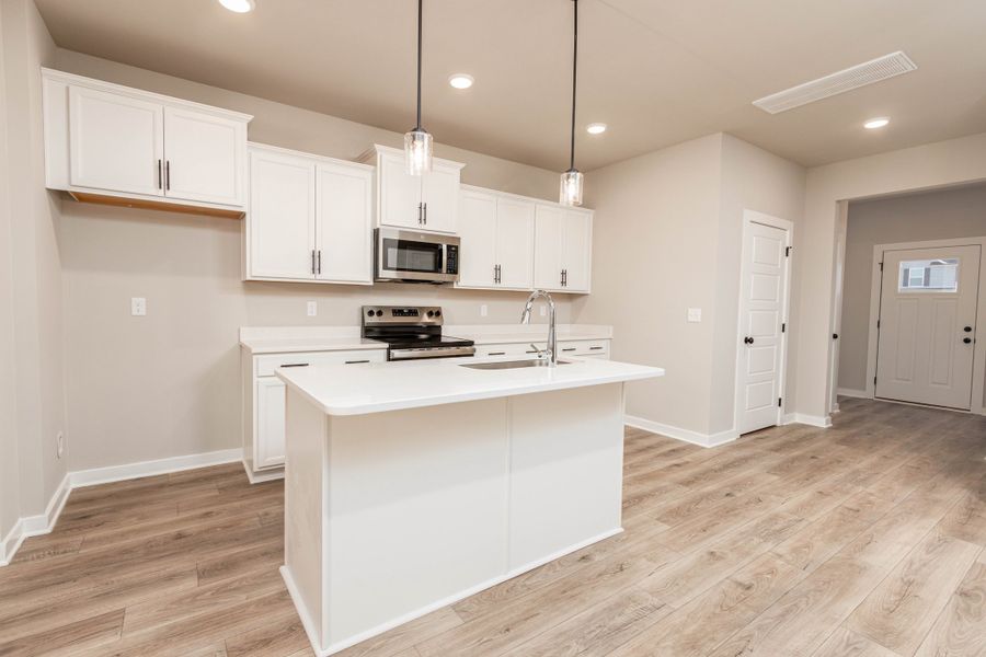 Representative furnished interior of a home built from the Cypress w/ Bonus Rm by Nason Homes in Woodland Farms, Dickson (Image 4).