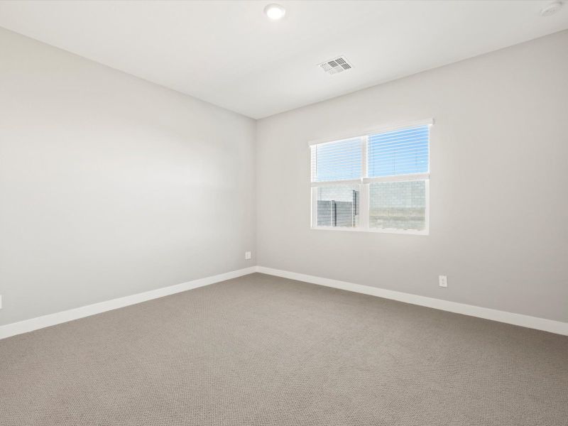 Spacious, unfurnished interior of a new home in White Tank Foothills Reserve Series, Waddell (Image 14).