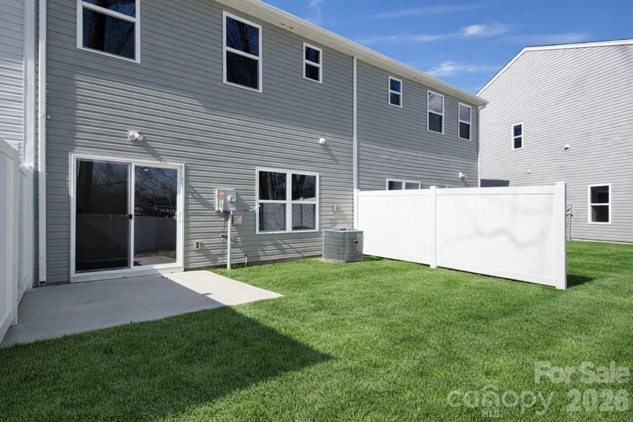 Exterior details and patio area of a home in , Charlotte (Image 2). Exterior details and patio area of a home in , Charlotte (Image 2).