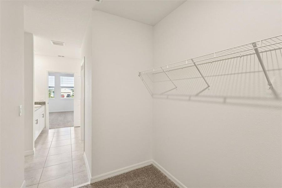 Spacious, unfurnished interior of a new home in The Reserve at Hammock Oaks - Classic Series, Lady Lake (Image 12).