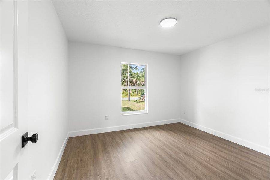 Spacious, unfurnished interior of a new home in , Port Charlotte (Image 21).