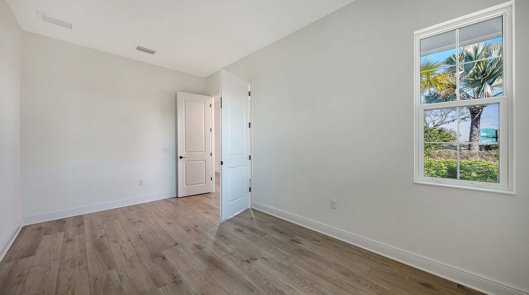 Spacious, unfurnished interior of a new home in Wildleaf, Parrish (Image 42).