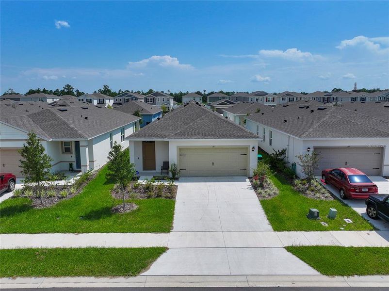 Front exterior of a new home in , Umatilla, FL, highlighting curb appeal (Image 22).