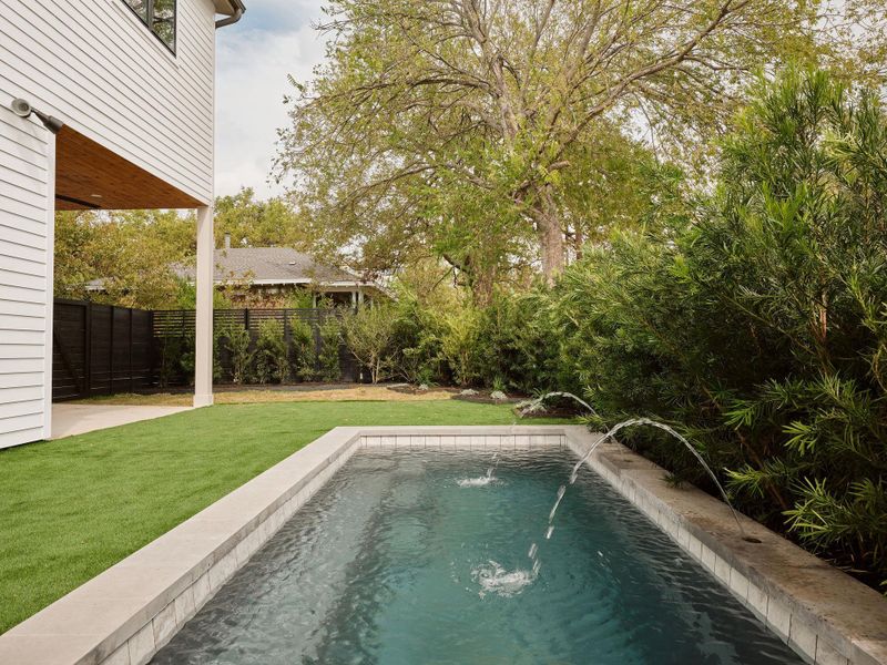 View of swimming pool with a patio and a fenced backyard View of swimming pool with a patio and a fenced backyard