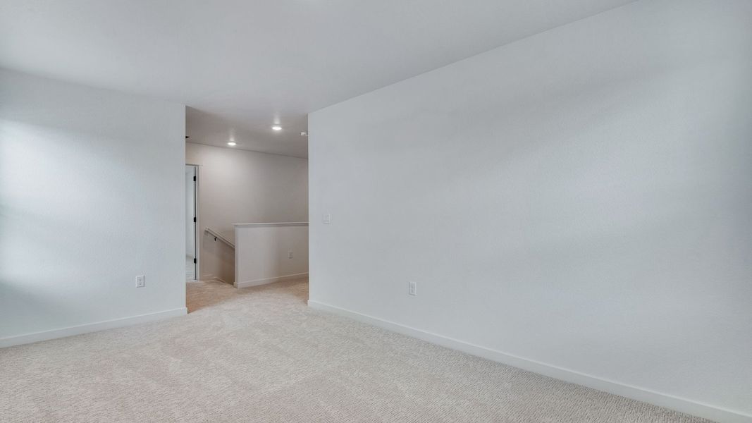 Spacious, unfurnished interior of a new home in Trails at Crowfoot, Parker (Image 19).