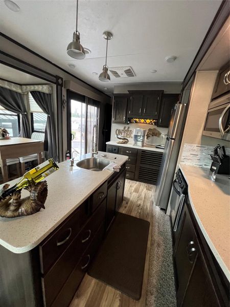 Furnished interior view inside a new home in , Okeechobee (Image 12).