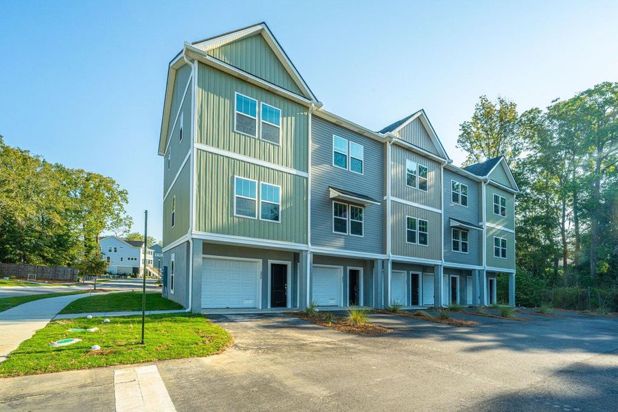 Front exterior of a new home in Bermuda Pointe Towns, Charleston, SC, highlighting curb appeal (Image 22).