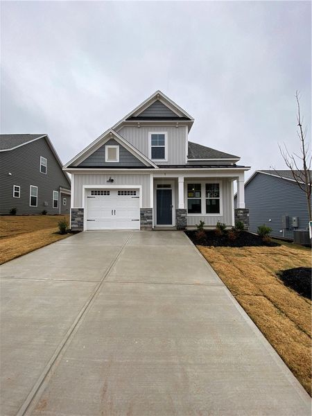 Front exterior of a new home in Springwood Grove, Central, SC, highlighting curb appeal (Image 16).